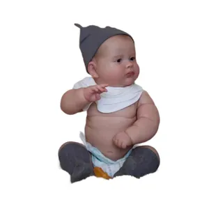 Lifelike 50cm full silicone reborn baby doll with gray knit cap and white bib in sitting pose