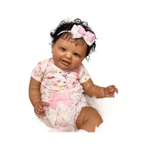 Realistic 60cm African American reborn baby doll with deep skin and floral dress