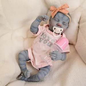 19-inch lifelike blue Avatar Reborn baby doll in pink romper with bottle and pacifier