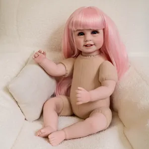 Realistic reborn baby doll with long pink hair and beige sleeveless romper on plush background