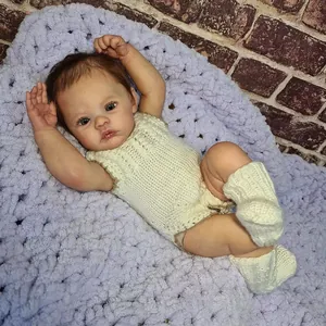 Realistic 18 inch newborn baby doll with 3D skin texture in cream knitted outfit