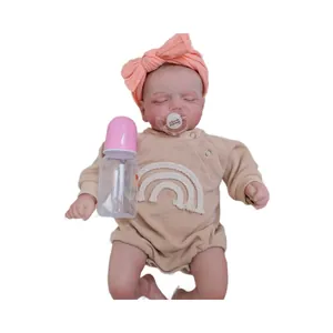 Realistic 48cm Rosalie reborn baby doll in beige waffle romper with bow headband