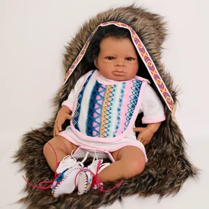 Detail of 50cm lifelike black skin baby doll with curly hair and ethnic style shoes