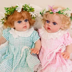 Detailed close-up of 12-inch fairy dolls with realistic skin, lace dresses and floral crowns