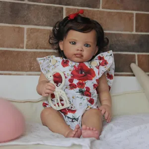 55cm realistic reborn baby girl doll Reuben with curly hair and giraffe toy