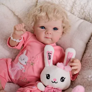 48cm Bettie reborn baby doll with blonde curly hair and pink little cutie romper