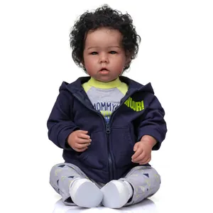 52cm Liam reborn baby doll with black curly hair and blue eyes in a hooded cardigan