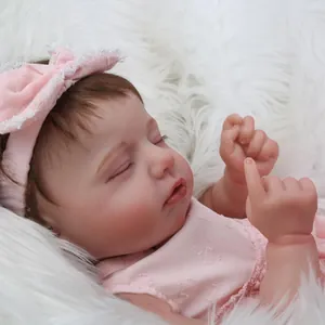 Poupée Reborn réaliste de 19 pouces endormie avec bandeau rose et robe à fleurs