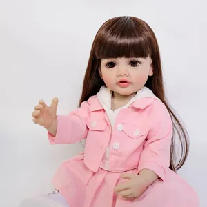 55cm realistic reborn baby doll Betty with long brown hair in pink and white outfit