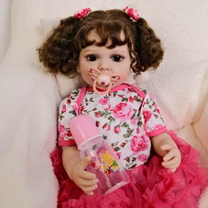 55cm lifelike reborn baby doll Betty with curly hair, pink floral dress and accessories