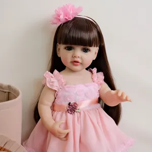 55cm lifelike reborn baby doll Betty with brown hair and pink floral dress
