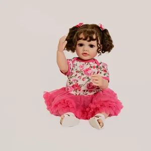 55cm lifelike reborn baby doll Betty with brown curls and pink floral tutu outfit
