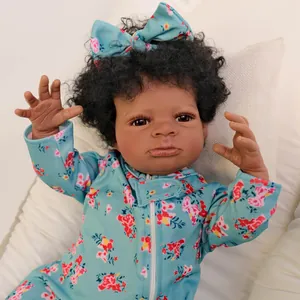19-inch lifelike deep skin baby doll Lanny in blue floral outfit with curly black hair