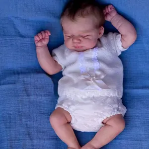Poupée reborn réaliste de 19 pouces nouveau-né endormi en tenue tricotée blanche et dentelle