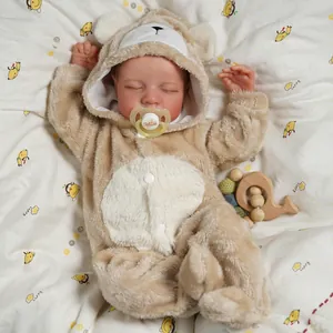19-inch lifelike reborn baby doll Levi sleeping in brown plush bear romper with pacifier