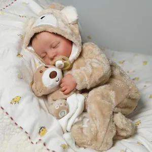 19-inch lifelike reborn baby doll Levi wearing a brown teddy bear plush jumpsuit with pacifier