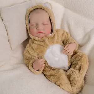 Close-up detail of realistic skin texture and closed eyes of a sleeping 19-inch reborn doll