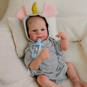 Realistic 18-inch reborn baby doll in striped onesie with unicorn hood and bottle
