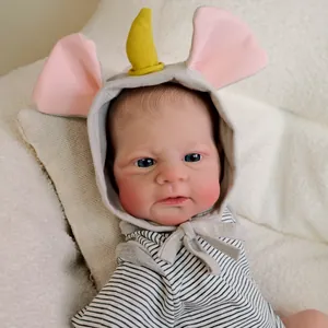 Realistic 18-inch reborn baby doll in striped jumpsuit with cute unicorn hooded hat