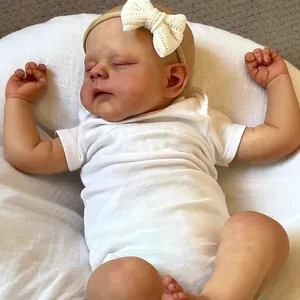 Poupée Erica reborn réaliste de 19 pouces dormant en body blanc avec un bandeau à nœud