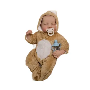 Realistic 19-inch sleeping reborn baby doll Levi in brown plush bear onesie with bottle