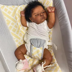 Realistic 19-inch sleeping newborn baby doll with dark skin and curly black hair
