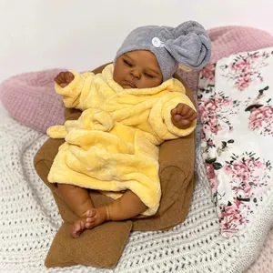 Lifelike 19-inch reborn baby doll in yellow plush bathrobe and grey turban for children