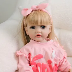 Realistic 22-inch reborn baby doll with blonde hair and pink bunny themed outfit
