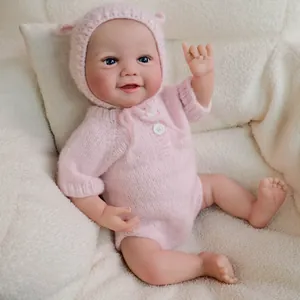 Realistic 19 inch reborn baby doll Emmy in pink knit romper with bear ear hat