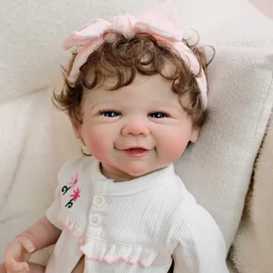 Lifelike 19-inch reborn baby doll with blue eyes, curly hair, and floral white outfit