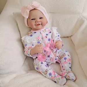 19-inch lifelike reborn baby doll in butterfly print onesie with pink bottle and pacifier