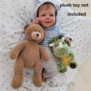 Realistic 19-inch reborn baby doll wearing blue striped hoodie and grey trousers