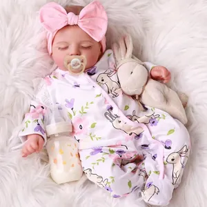 Lifelike 18-inch sleeping reborn baby doll Rosalie in floral romper with bunny plush