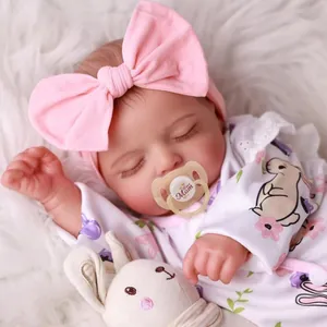 Lifelike 18 inch Rosalie reborn baby doll in bunny pajamas with plush rabbit and pacifier