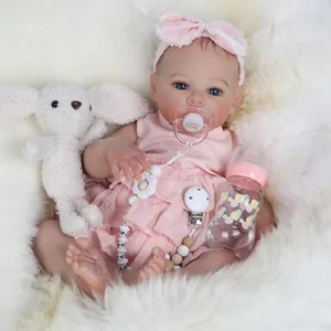 Poupée bébé reborn Meadow 18 pouces en robe dentelle rose avec lapin en peluche et biberon