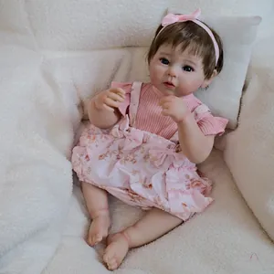 19-inch lifelike reborn baby girl doll Raven in pink floral dress with hair bow