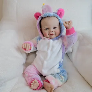 Realistic 19-inch reborn baby doll wearing a colorful rainbow unicorn plush onesie