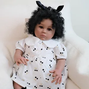 Lifelike 24 inch reborn doll with dark skin curly hair and cherry print dress