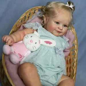 50cm realistic reborn baby doll Maddie with blonde hair and lace blue dress in a basket