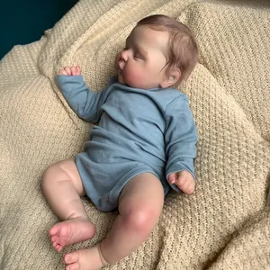 Lifelike 19-inch reborn sleeping doll in blue romper with hand-painted 3D skin texture