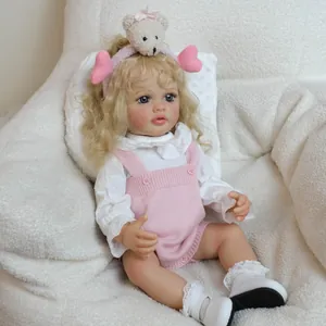 Poupée bébé reborn réaliste 22 pouces Betty en barboteuse rose et bandeau d'ours