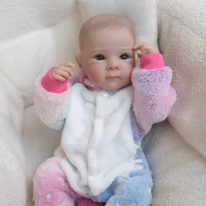 18-inch realistic reborn baby doll in pink unicorn jumpsuit with soft blue eyes and skin