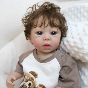 Realistic 19-inch reborn baby doll with brown curly hair and blue eyes in a teddy bear outfit