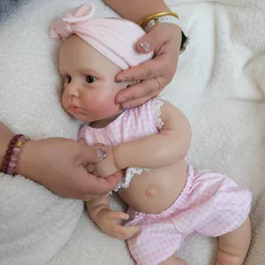 Realistic 18 inch solid silicone baby doll in pink plaid lace outfit and headband