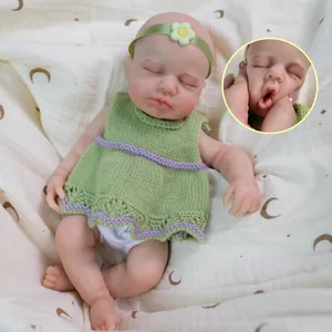 12-inch realistic soft silicone baby doll in green knitted dress with headband