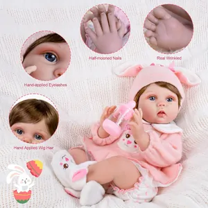 Poupée Reborn de 22 pouces en tenue de lapin rose avec biberon et cheveux enracinés main
