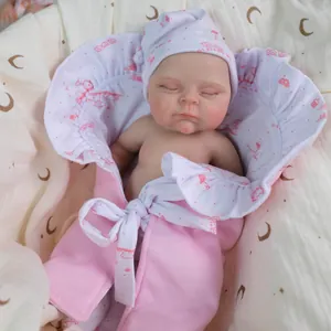 12-inch lifelike solid silicone reborn baby doll in pink floral bunting and matching hat