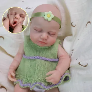 12-inch realistic solid silicone baby doll in green knit sleeveless dress with floral headband
