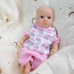 Lifelike 8-inch full body silicone reborn baby doll in pink elephant print outfit
