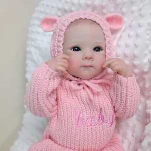 Poupée reborn réaliste de 18 pouces en pull rose avec texture de peau 3D détaillée